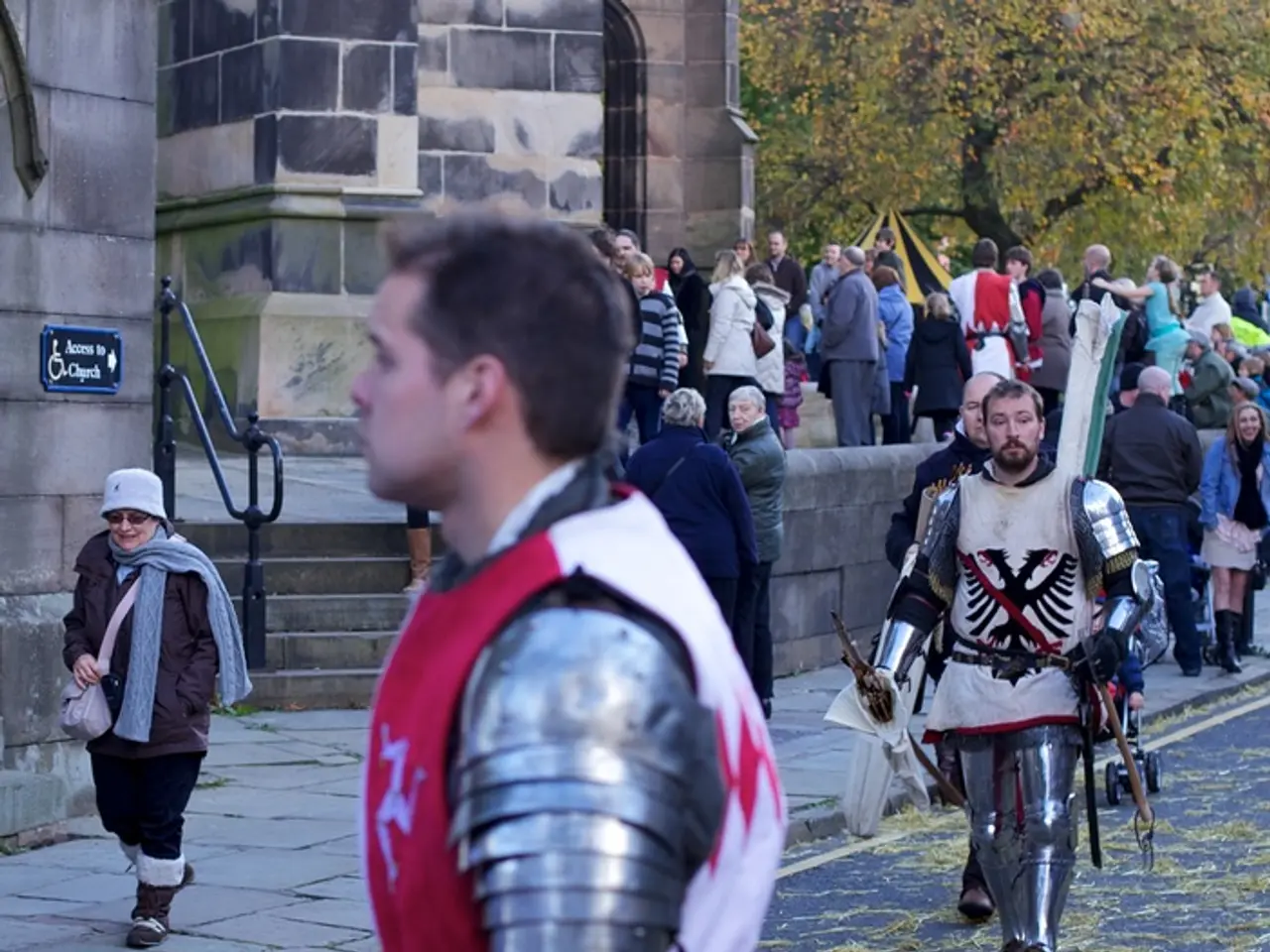 In the image there are two men in armor and shield standing on the road with sword in their hands,...