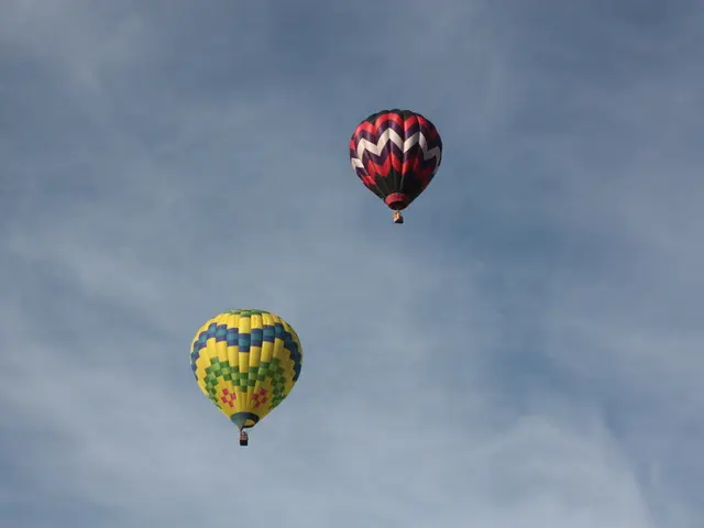 Illuminated hot air balloons with unique forms fill the skies of Cappadocia during the Turkish...